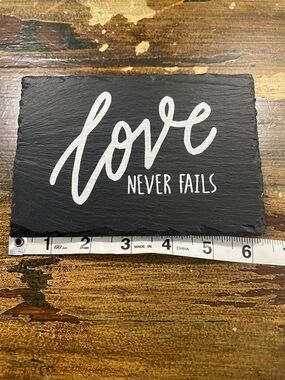 Love Never Fails Black Slate Sign